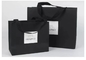 OEM ब्लैक व्हाइट परिधान पेपर बैग वस्त्र संगमरमर पेपर उपहार बैग