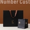 ग्रोसग्रेन हैंडल मैट ब्लैक पेपर बैग गोल्ड हॉट स्टैम्पिंग रिटेल पेपर शॉपिंग बैग